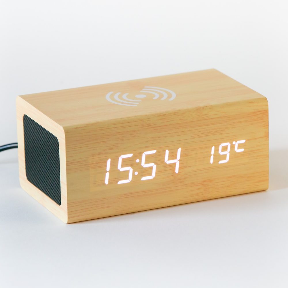 Digitalna ura z brezžičnim polnjenjem in bluetooth zvočnikom